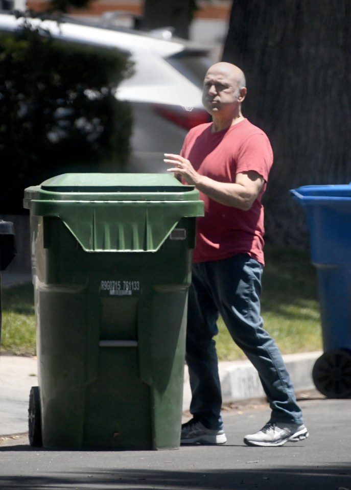 Paris Themmen, former child actor, taking out the trash.