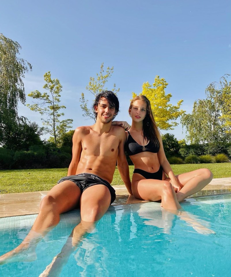 Young couple by a pool.