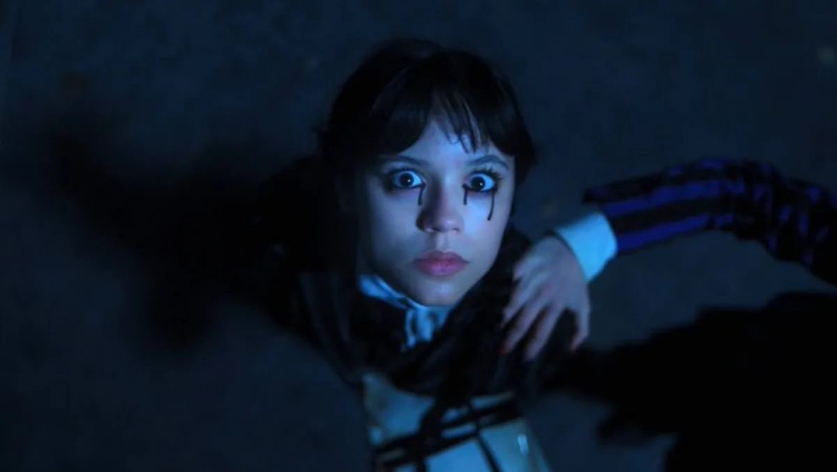 image of wednesday from season two bleeding from the eyes like a horror movie