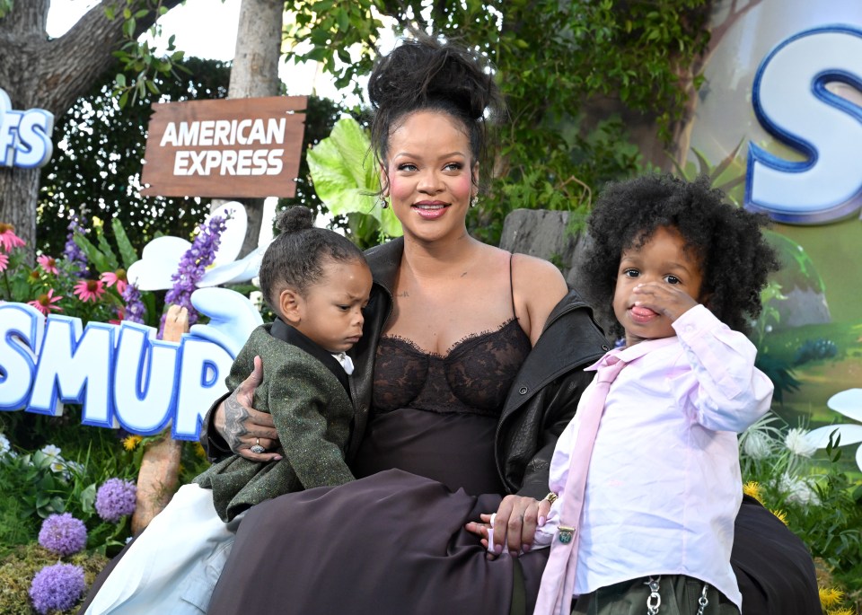 Rihanna with her two children at the Smurfs movie premiere.