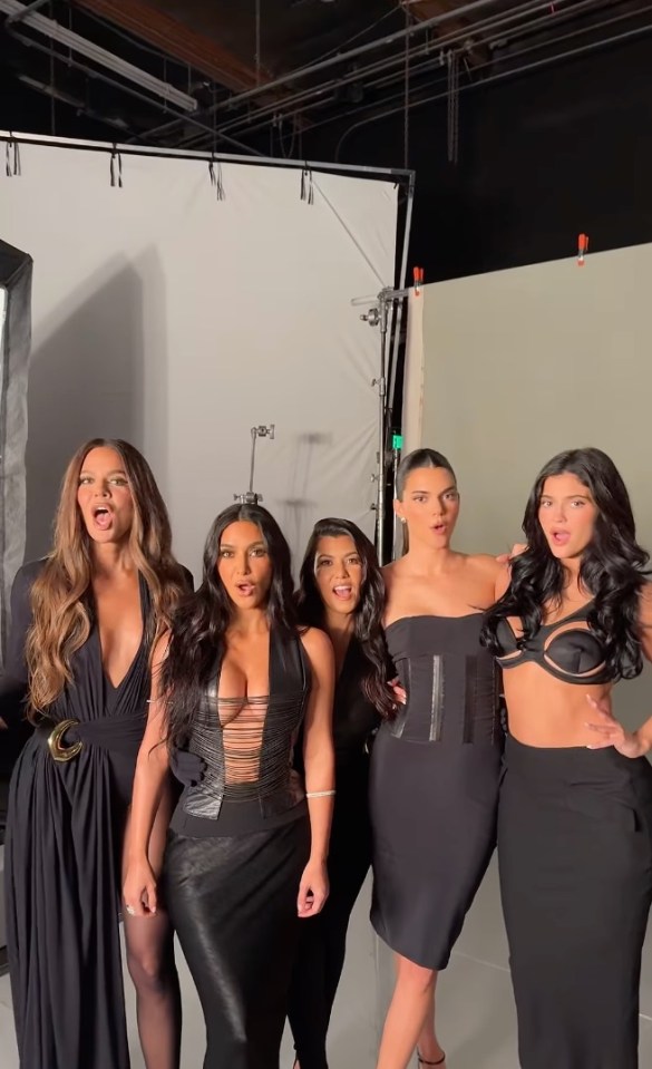 Kourtney Kardashian and family during a photoshoot.