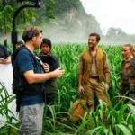 image of gareth edwards with jonathan bailey and scarlett johansson behind the scenes of jurassic world rebirth