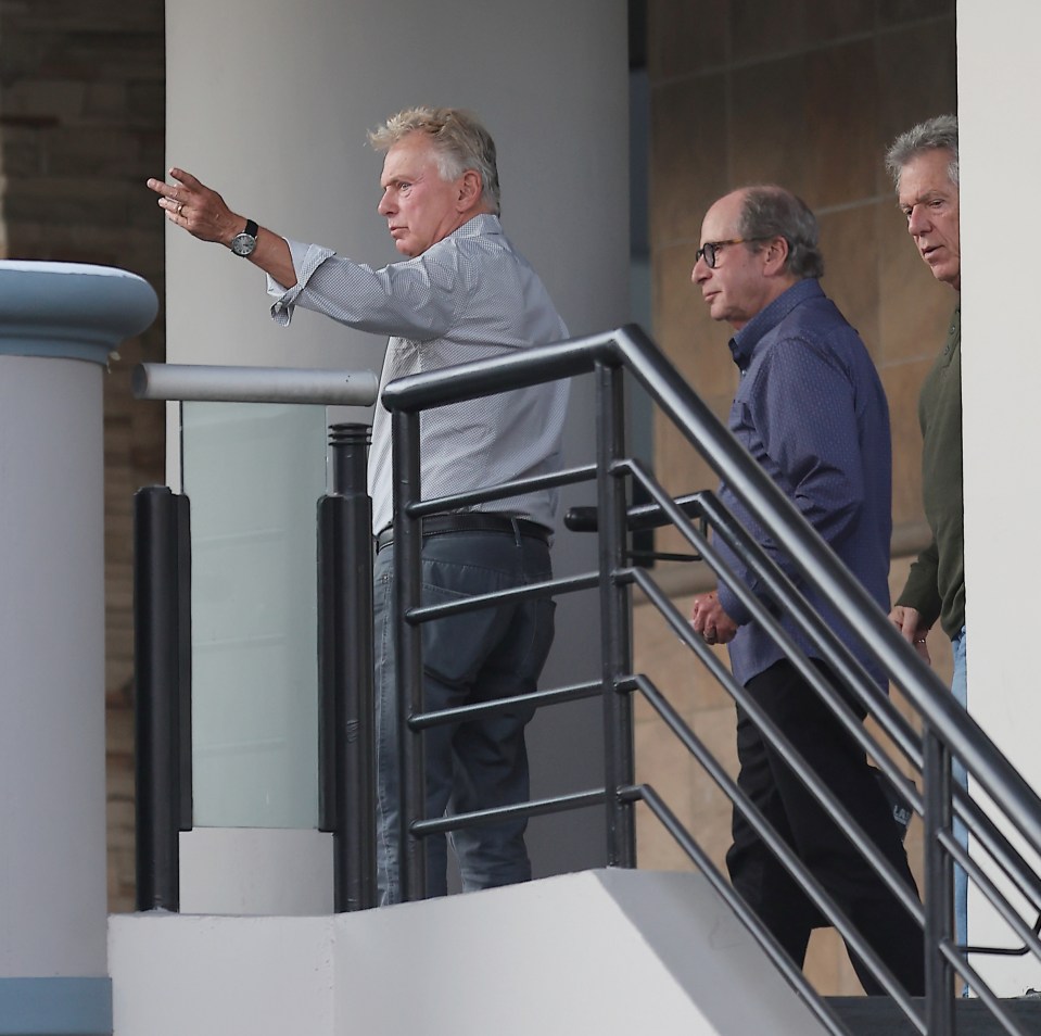 Pat Sajak with friends outside a restaurant.
