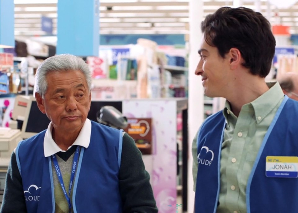 Two Cloud9 employees talking in a store.