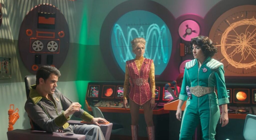 Paul Wesley, Jess Bush, and Melissa Navia in the Star Trek: Strange New Worlds episode A Space Adventure Hour.