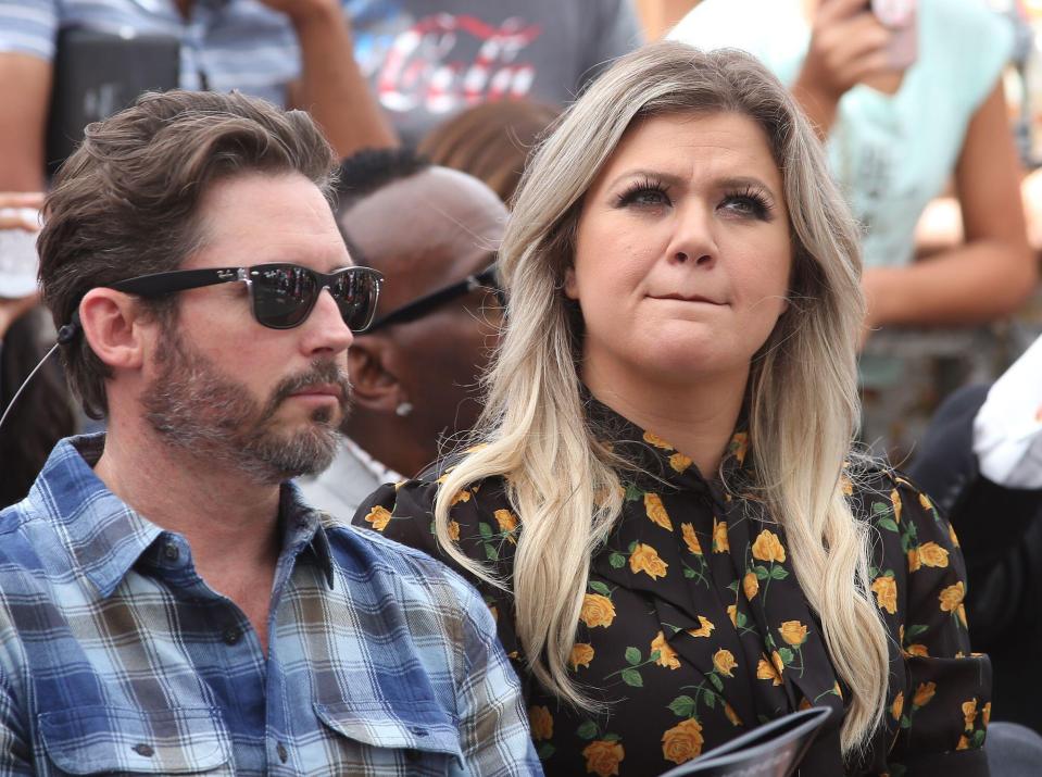 Kelly Clarkson and Brandon Blackstock at an event.