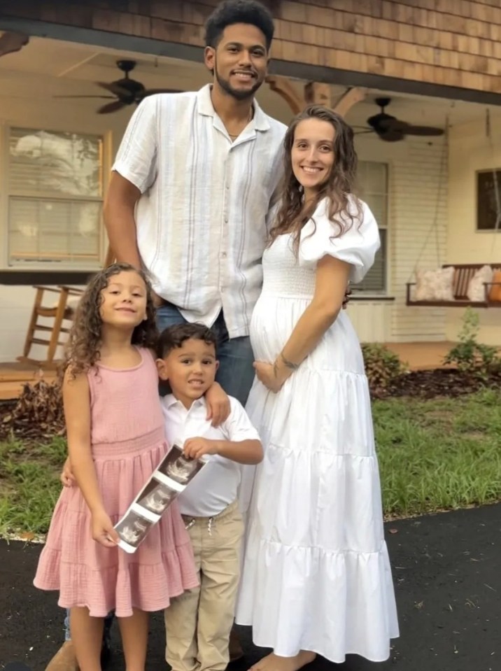 Family photo announcing pregnancy and newborn.
