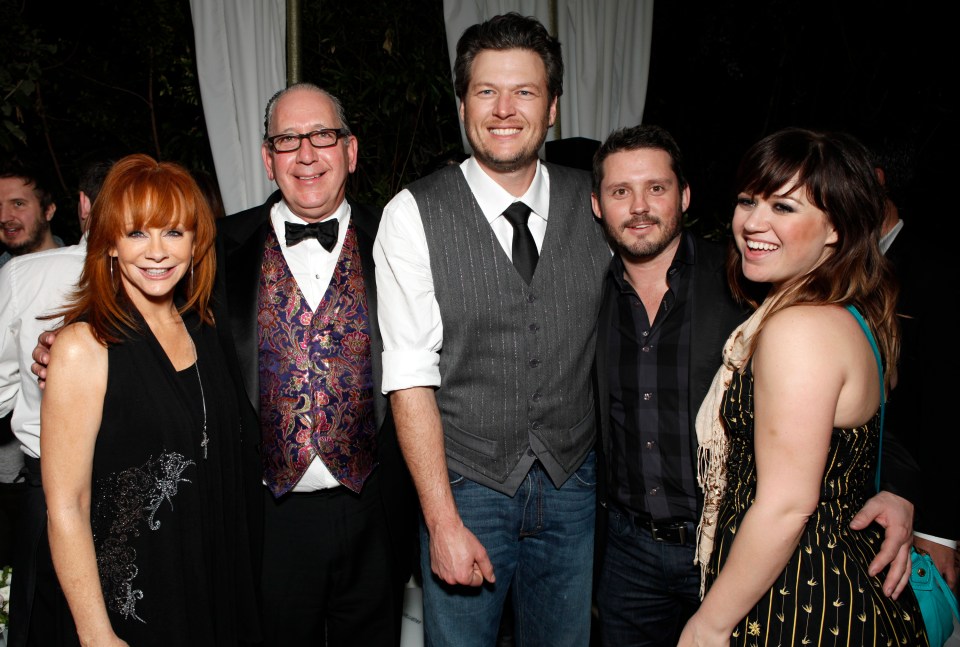 Reba McEntire, Blake Shelton, and others at a Warner Music Group Grammy celebration.