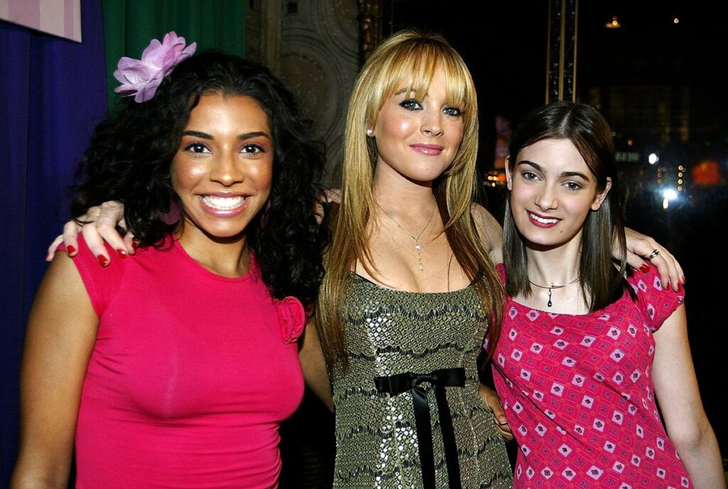 Christina Vida, Lindsay Lohan, and Haley Hudson arrive at the premiere of the Disney film Freaky Friday at the El Capitan theater on August 4, 2003