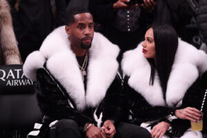 Safaree Samuels and Erica Mena attend Utah Jazz v Brooklyn Nets