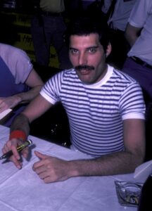 Freddie Mercury of Queen at a press conference.