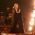 Kelly Clarkson performing on The Voice.