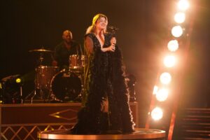 Kelly Clarkson performing on The Voice.