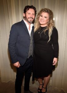 Kelly Clarkson and Brandon Blackstock backstage.