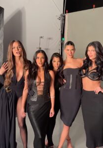 Kourtney, Kim, Khloe, Kendall, and Kylie Kardashian at a photoshoot.