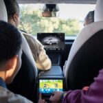 Tesla cars will soon let you play games while they drive themselves says Elon Musk
