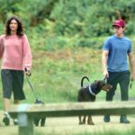 Tom Holland and Zendaya walking their dog.